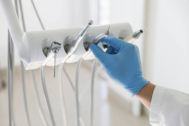 Professional Tooth Extraction technician working in St. Peter, WI